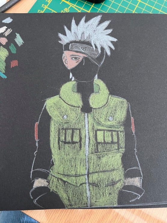 Personnage de manga aux crayons de couleur